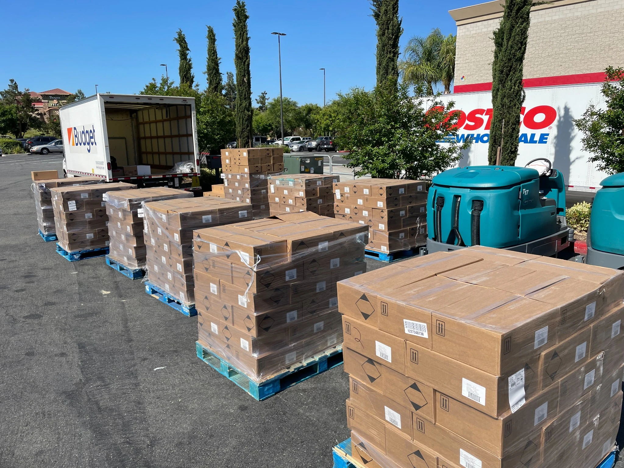 Wholesale inventory prepared beside a delivery truck